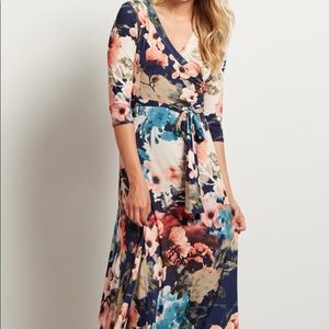 3/4 sleeve Cool and comfortable, no iron needed. Rich winter water colors